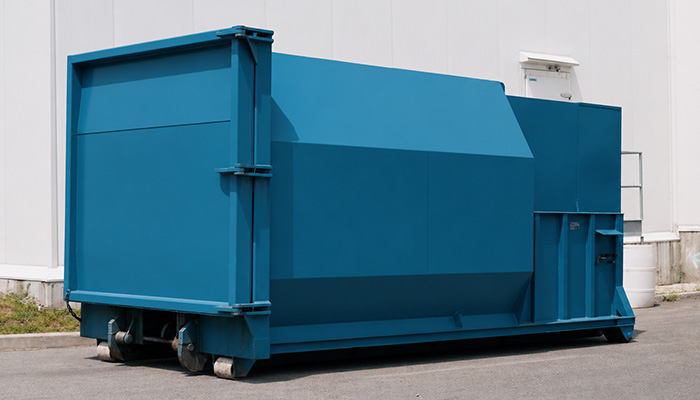 Combiné compacteur-conteneur